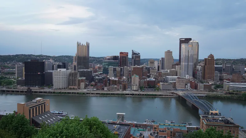 Pittsburgh Pennsylvania city skyline over river at dusk