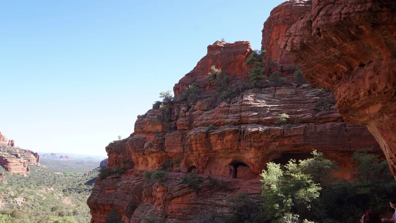Ancient cliff dwelling in dramatic Sedona Arizona red rock canyon