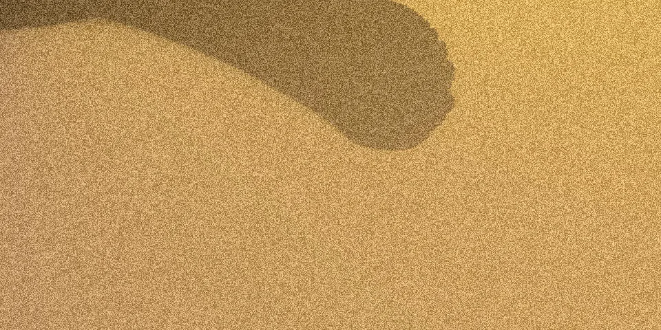 Burning ship fractal with dark shape in top left on warm golden gradient background and film grain noise