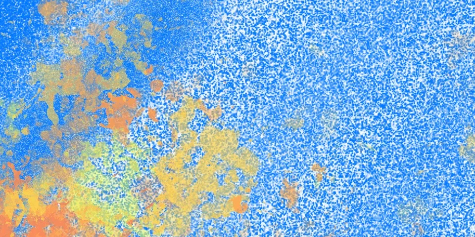 Blue speckled texture with yellow and orange patches concentrated on the left side